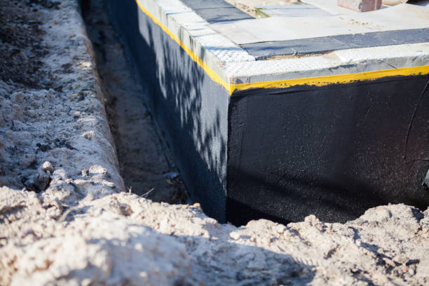 Professional Emergency Waterproofing technician working in Chagrin Falls, OH